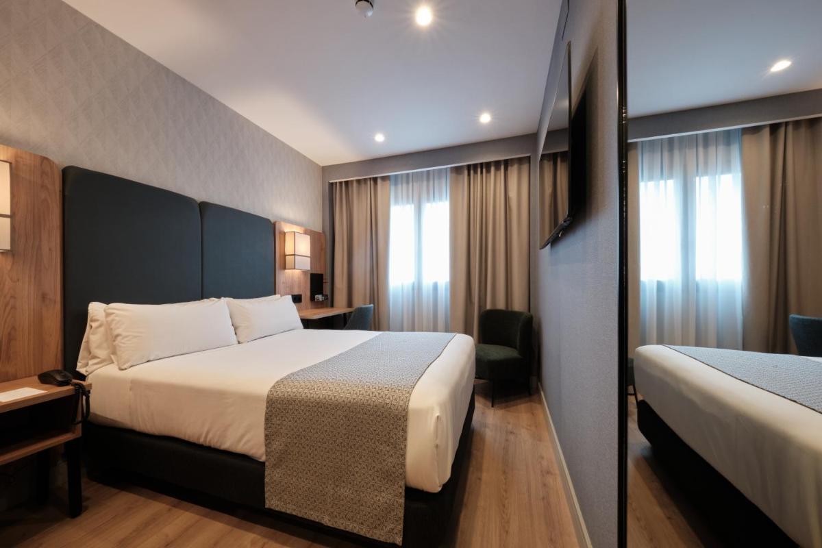 Cama o camas de una habitación en Catalonia La Maquinista
