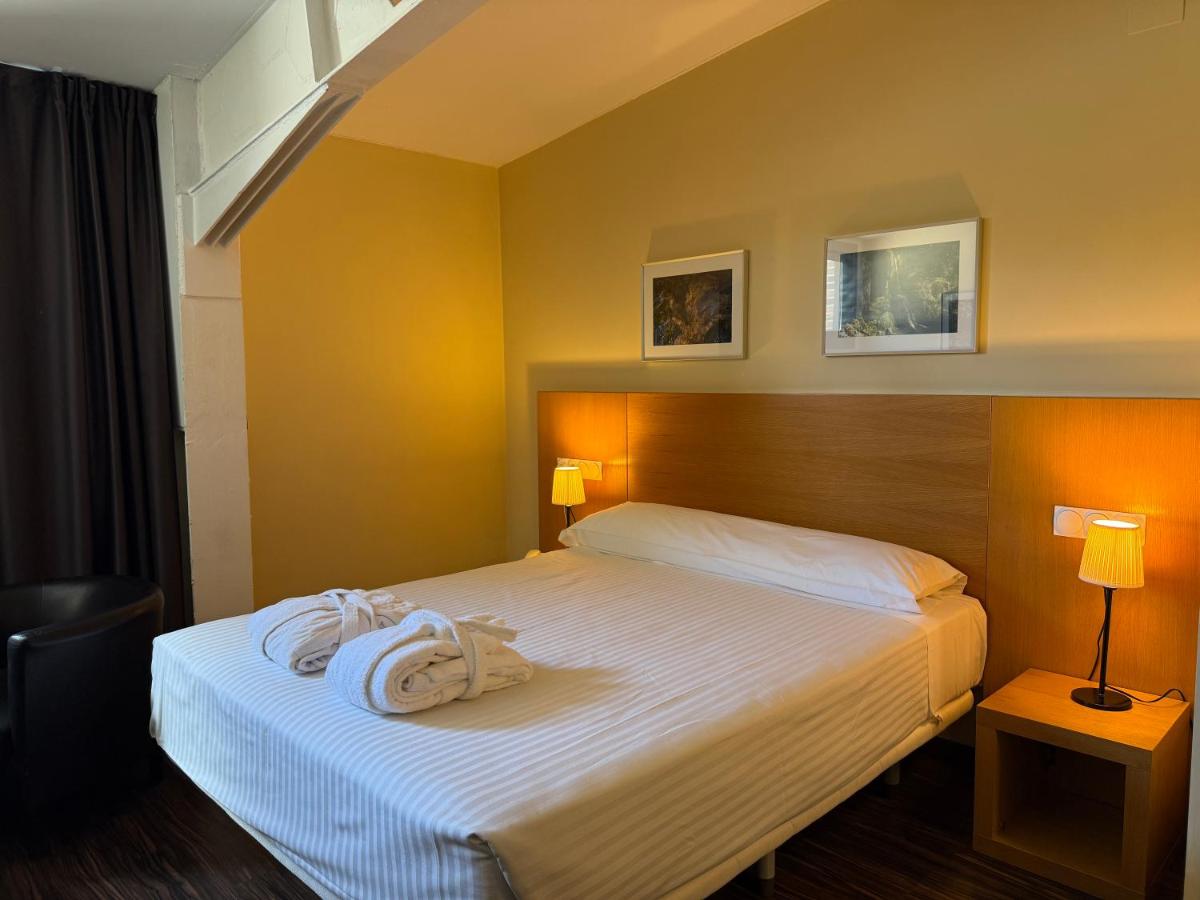 Cama o camas de una habitación en Hotel Balneario de Lanjarón