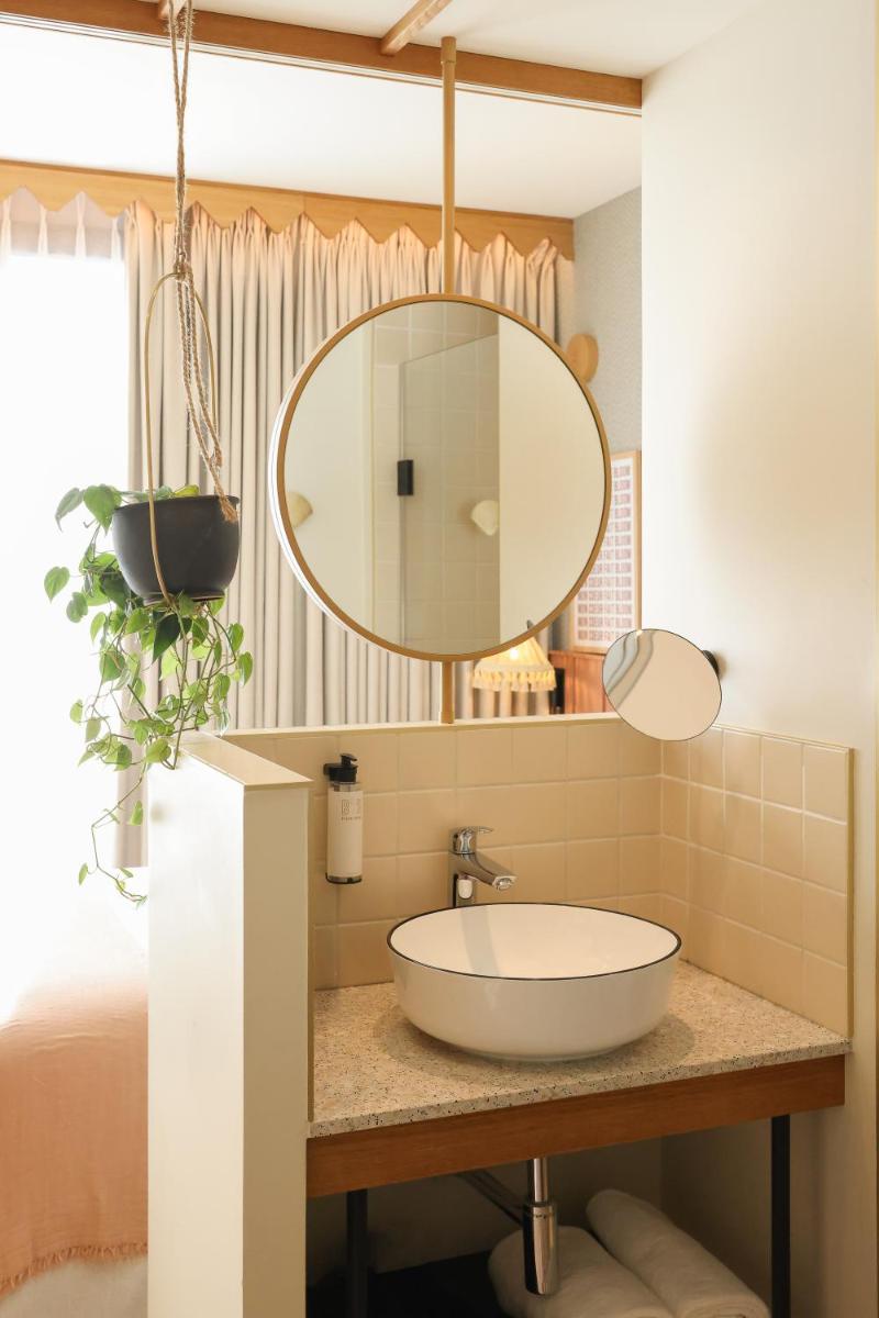 Salle de bains dans l'établissement Bloom House Hôtel & SPA
