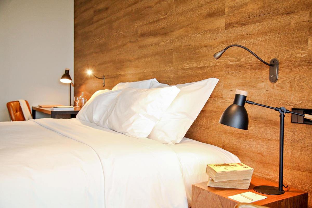 Uma cama ou camas num quarto em Octant Ponta Delgada
