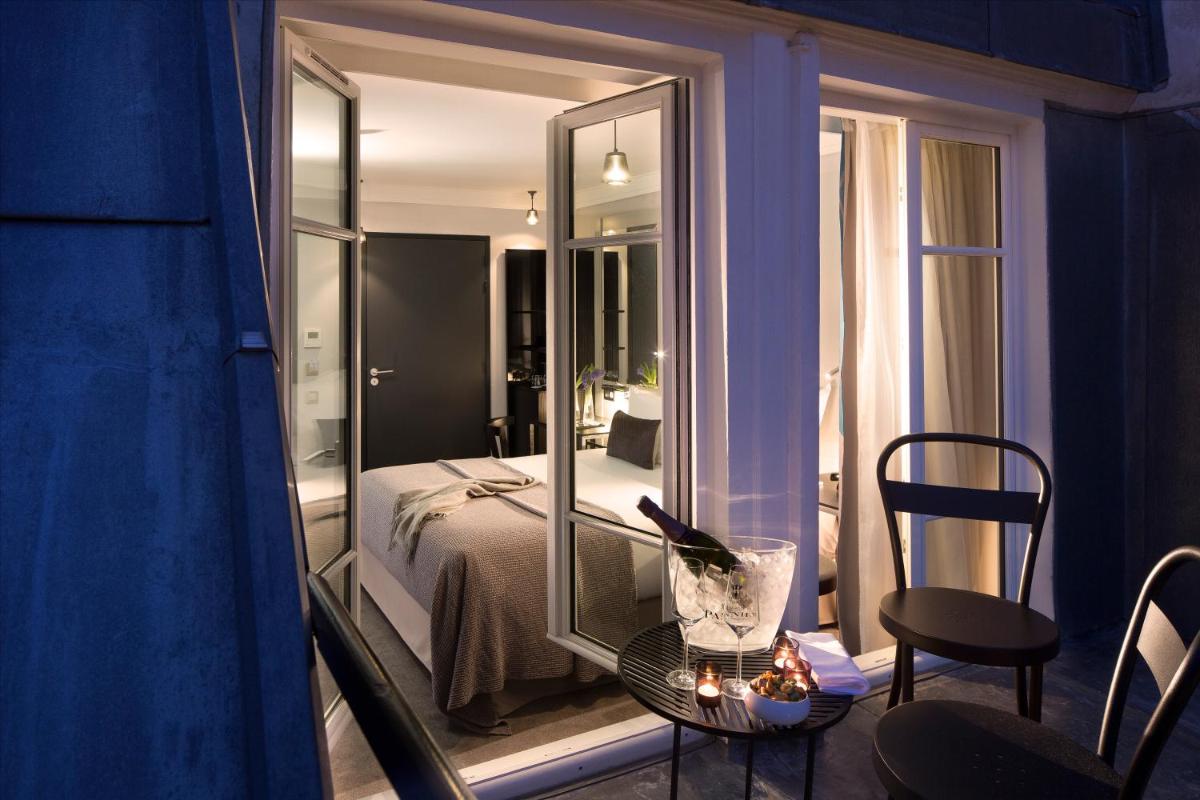 Un ou plusieurs lits dans un hébergement de l'établissement Les Matins de Paris & Spa
