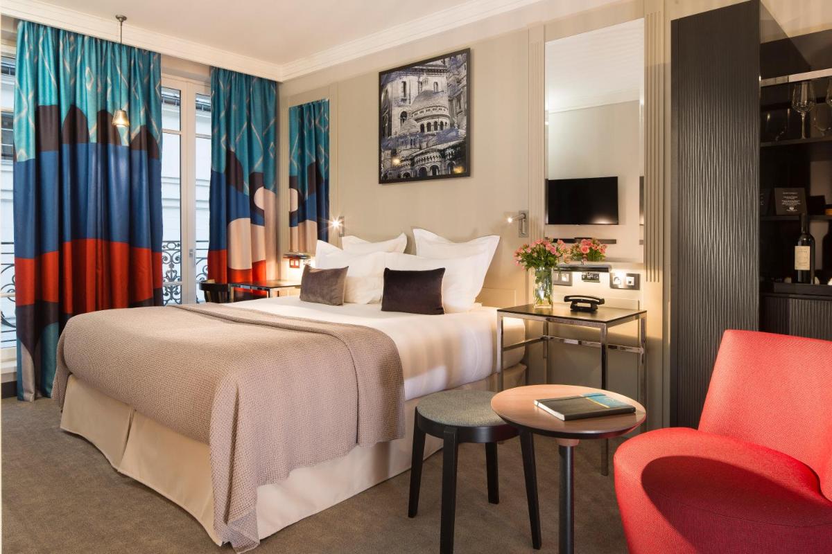 Un ou plusieurs lits dans un hébergement de l'établissement Les Matins de Paris & Spa