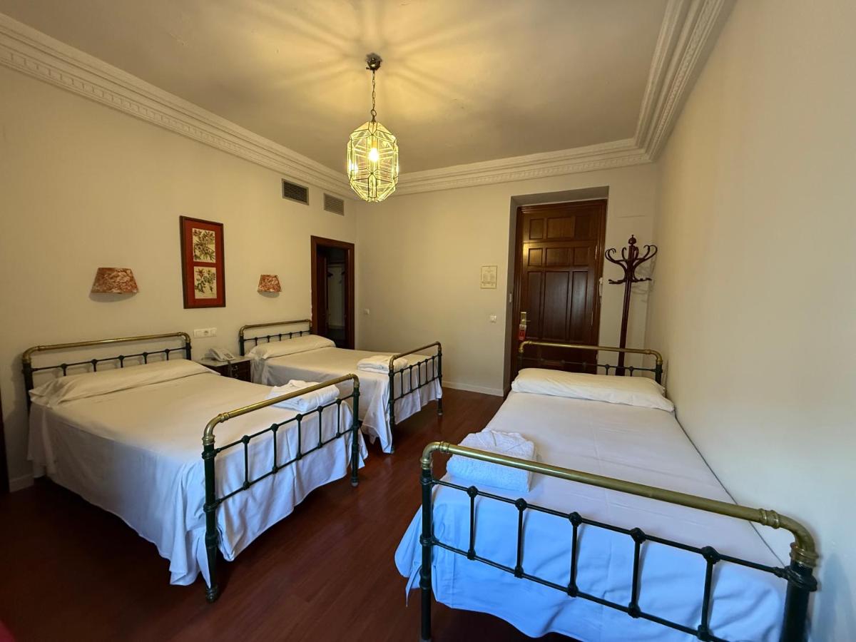 Cama o camas de una habitación en Hotel Parque Balneario Termas Pallares