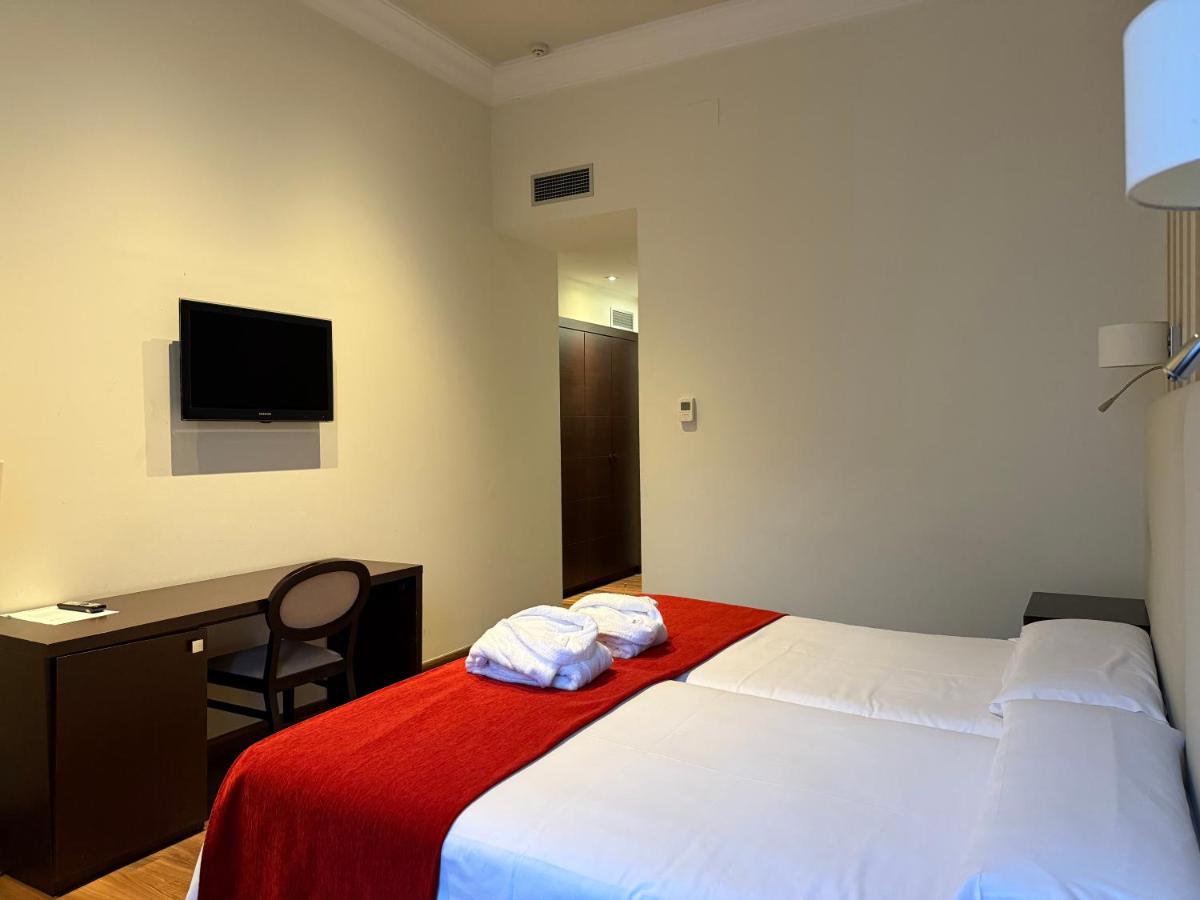 Cama o camas de una habitación en Hotel Termas Balneario Termas Pallares