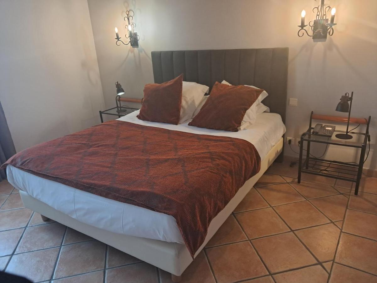 Un ou plusieurs lits dans un hébergement de l'établissement Le Relais Des Trois Mas