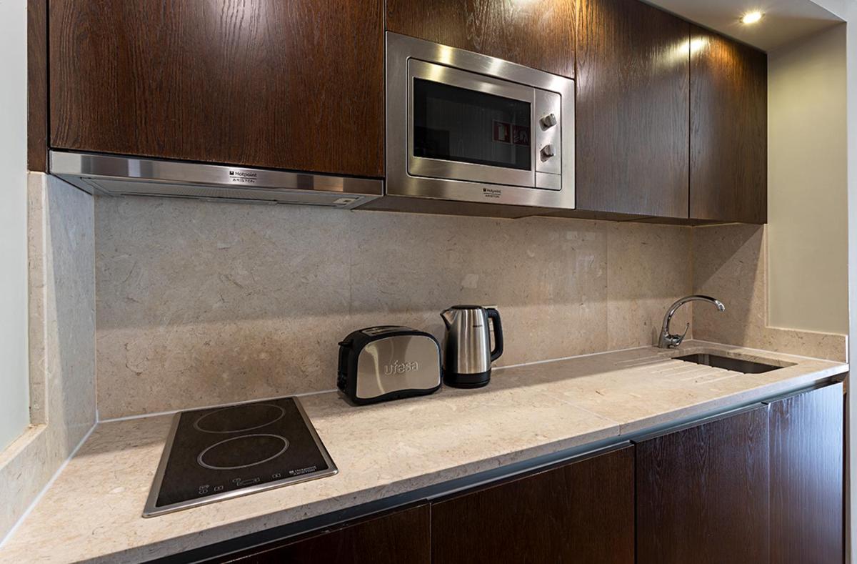 A cozinha ou kitchenette de Pestana Alvor Praia Premium Beach & Golf Resort
