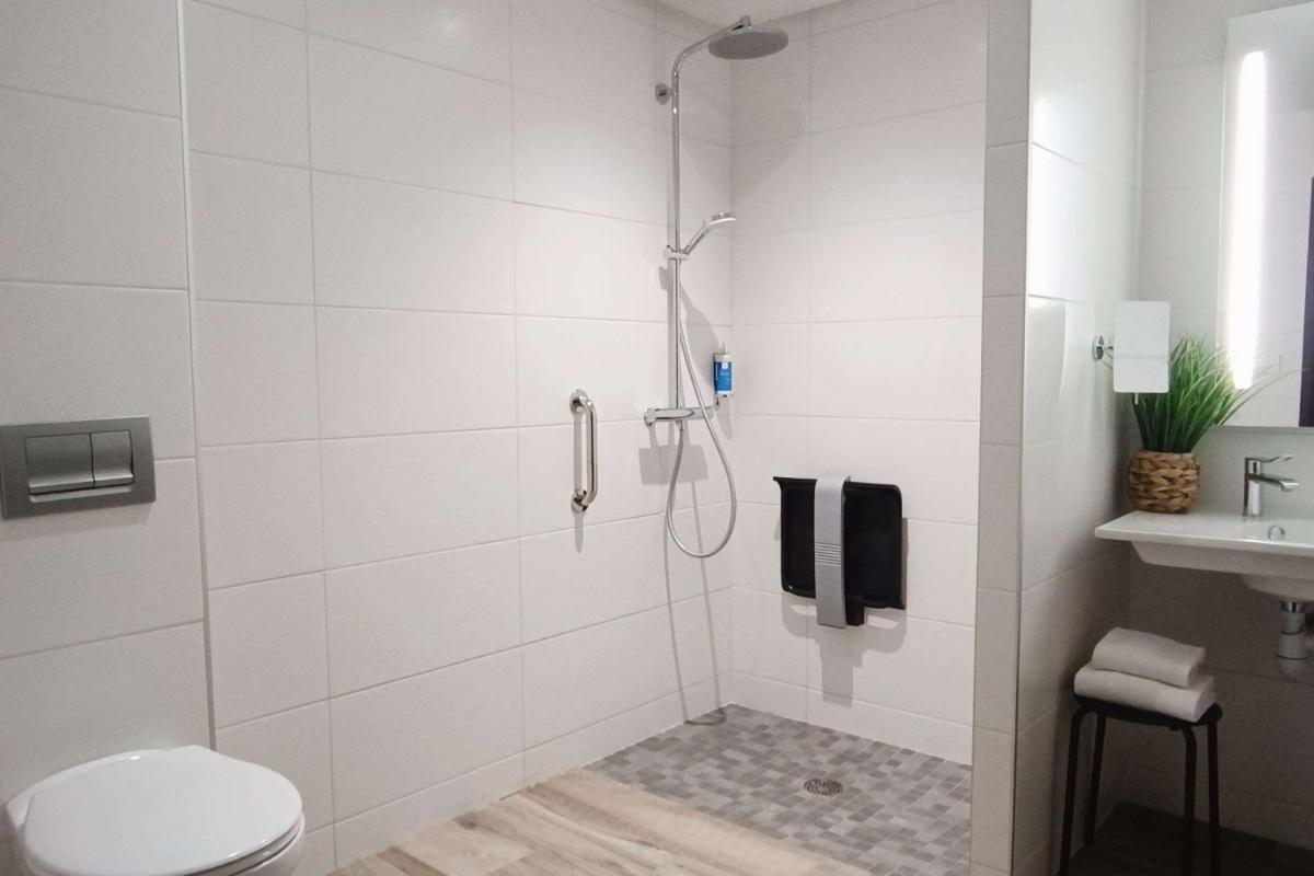 Salle de bains dans l'établissement Best Western Hôtel De La Cité & Spa