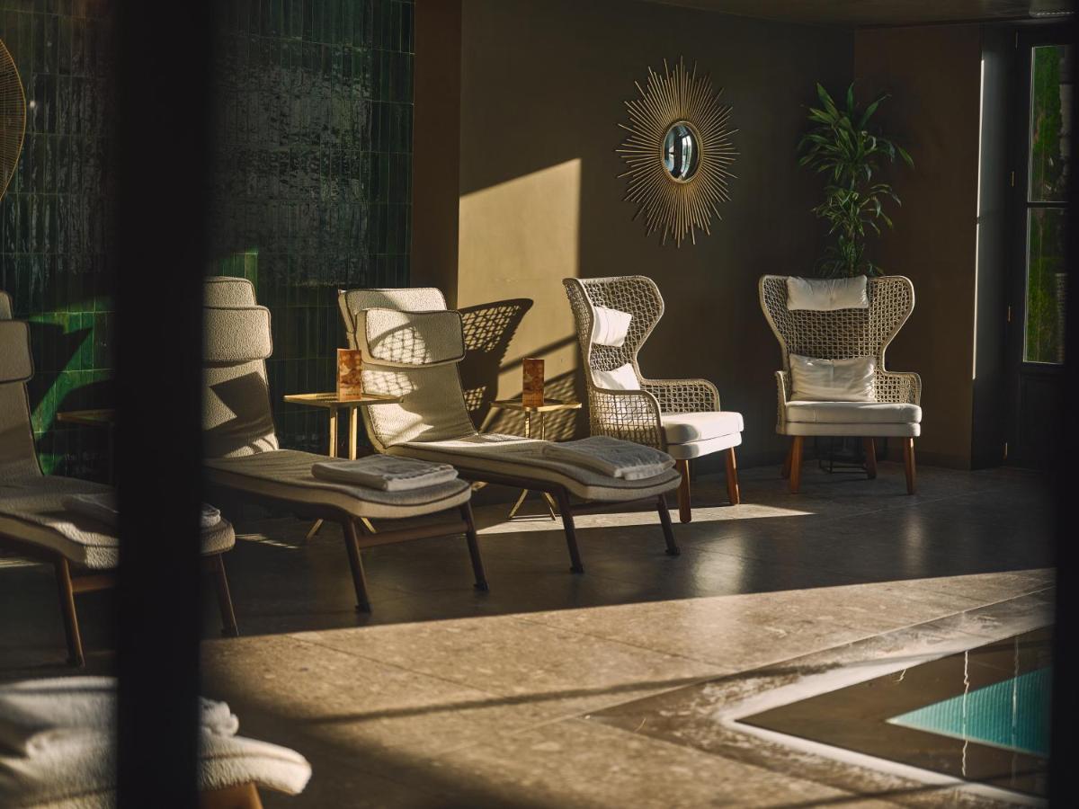 Uma área de estar em GA Palace Hotel & Spa, a XIXth-Century Villa