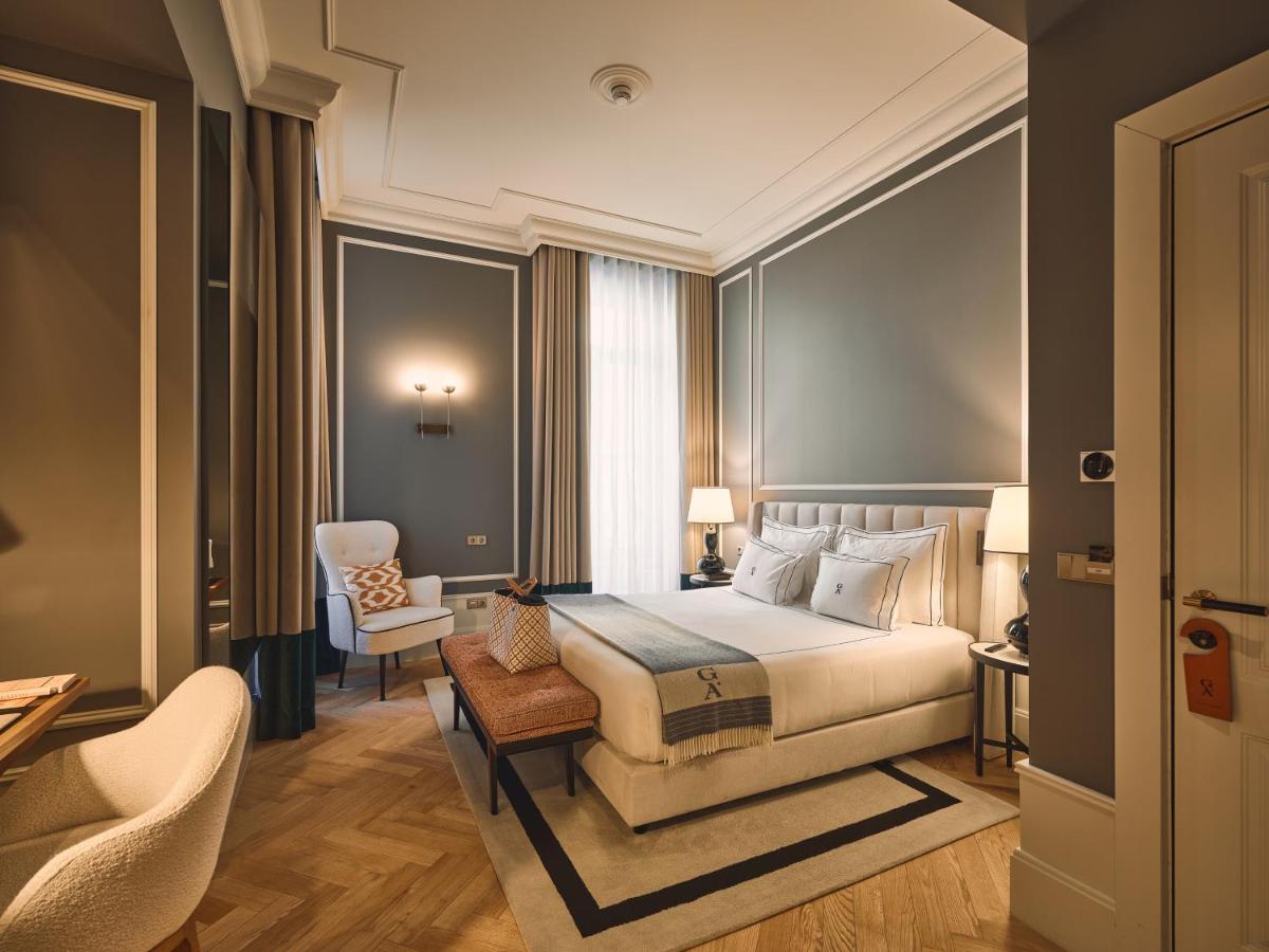 Uma cama ou camas num quarto em GA Palace Hotel & Spa, a XIXth-Century Villa