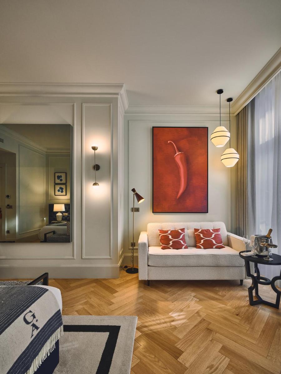 Uma área de estar em GA Palace Hotel & Spa, a XIXth-Century Villa