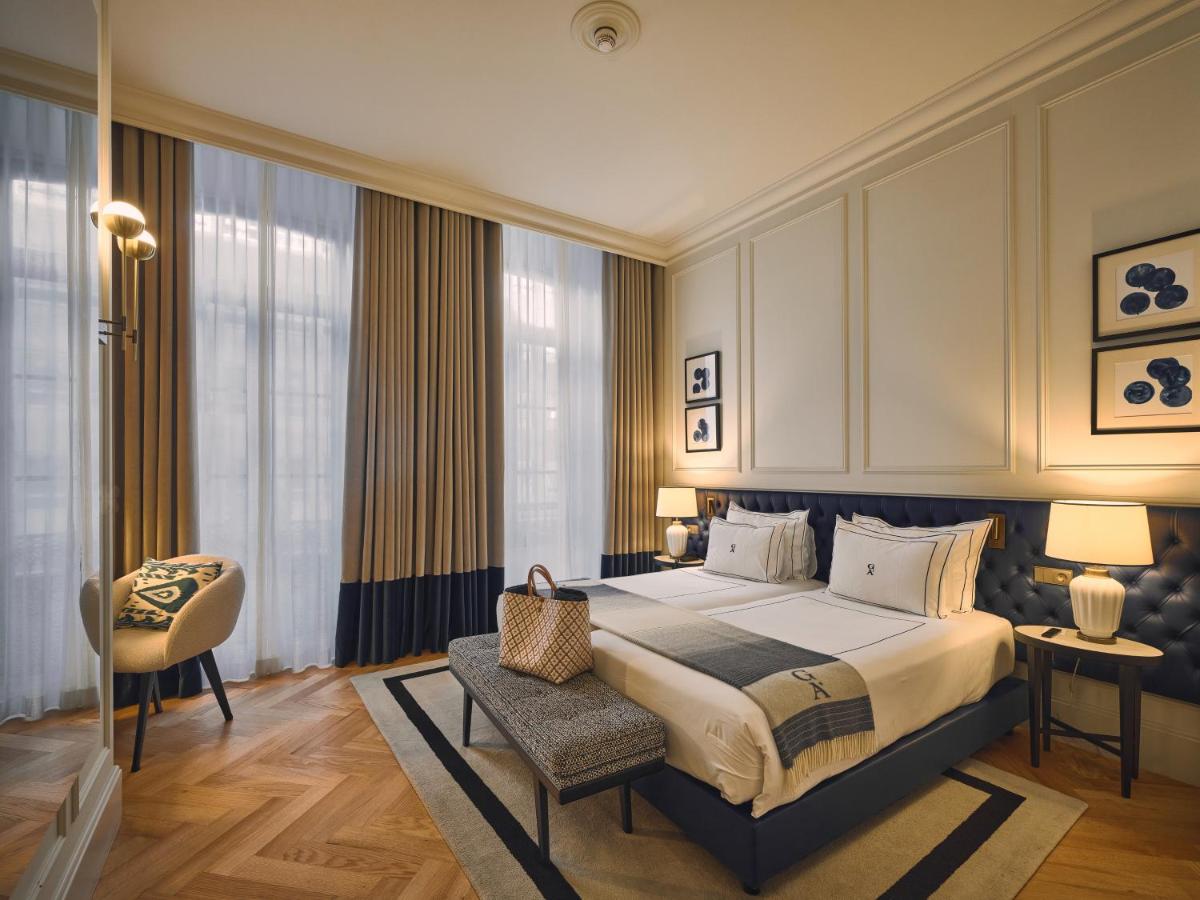 Uma cama ou camas num quarto em GA Palace Hotel & Spa, a XIXth-Century Villa