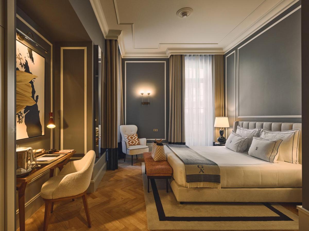 Uma área de estar em GA Palace Hotel & Spa, a XIXth-Century Villa