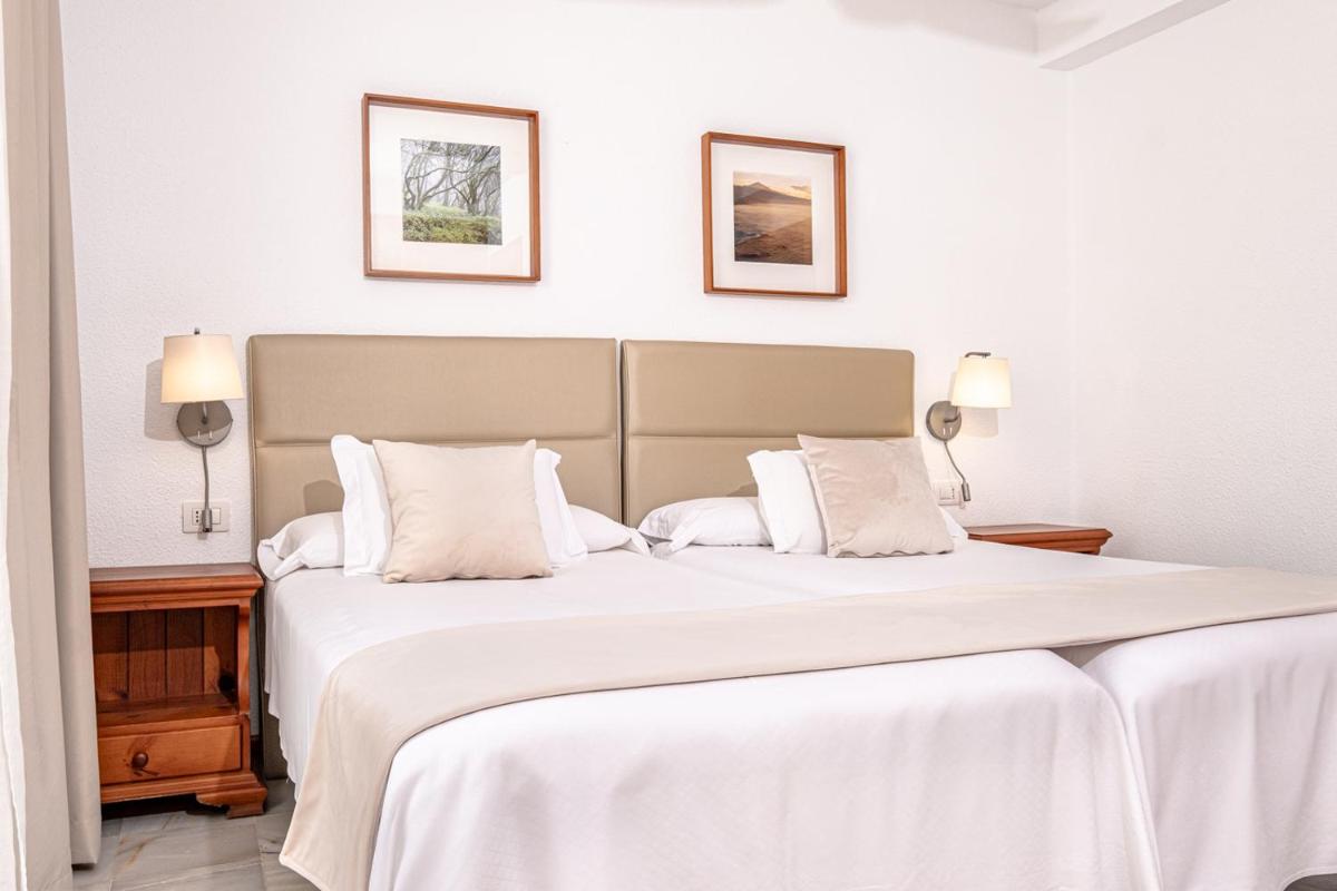 Cama o camas de una habitación en Parque Santiago III Official