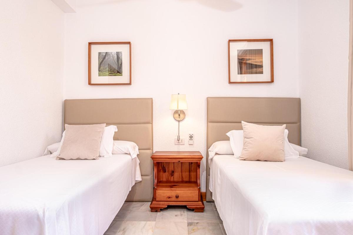 Cama o camas de una habitación en Parque Santiago III Official