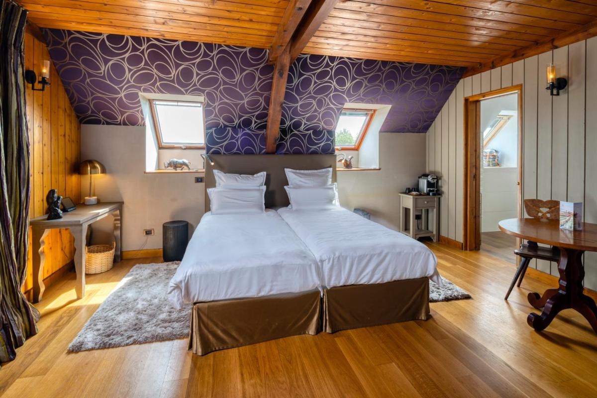Un ou plusieurs lits dans un hébergement de l'établissement Hotel des Berges, Restaurant Gastronomique & Spa