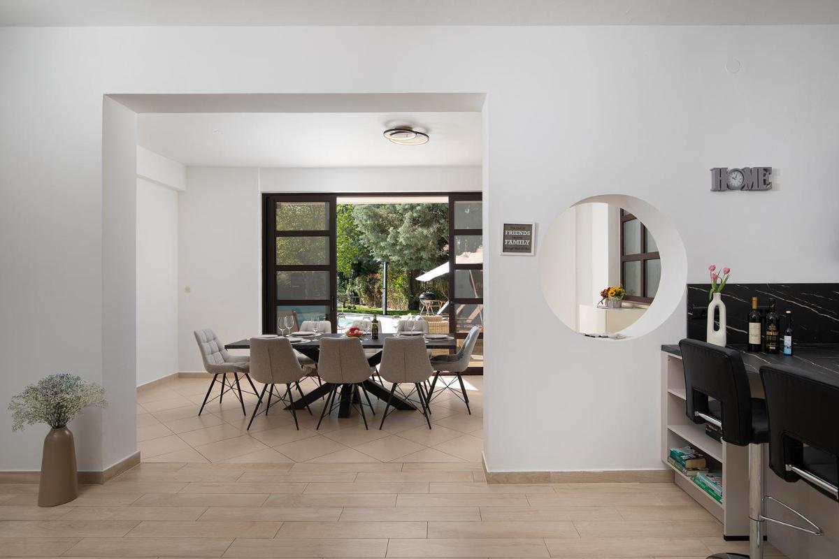 Villa Andrija Family Dream with heated pool at the sea with beautiful garden, outside cinema and kids playground - Housity