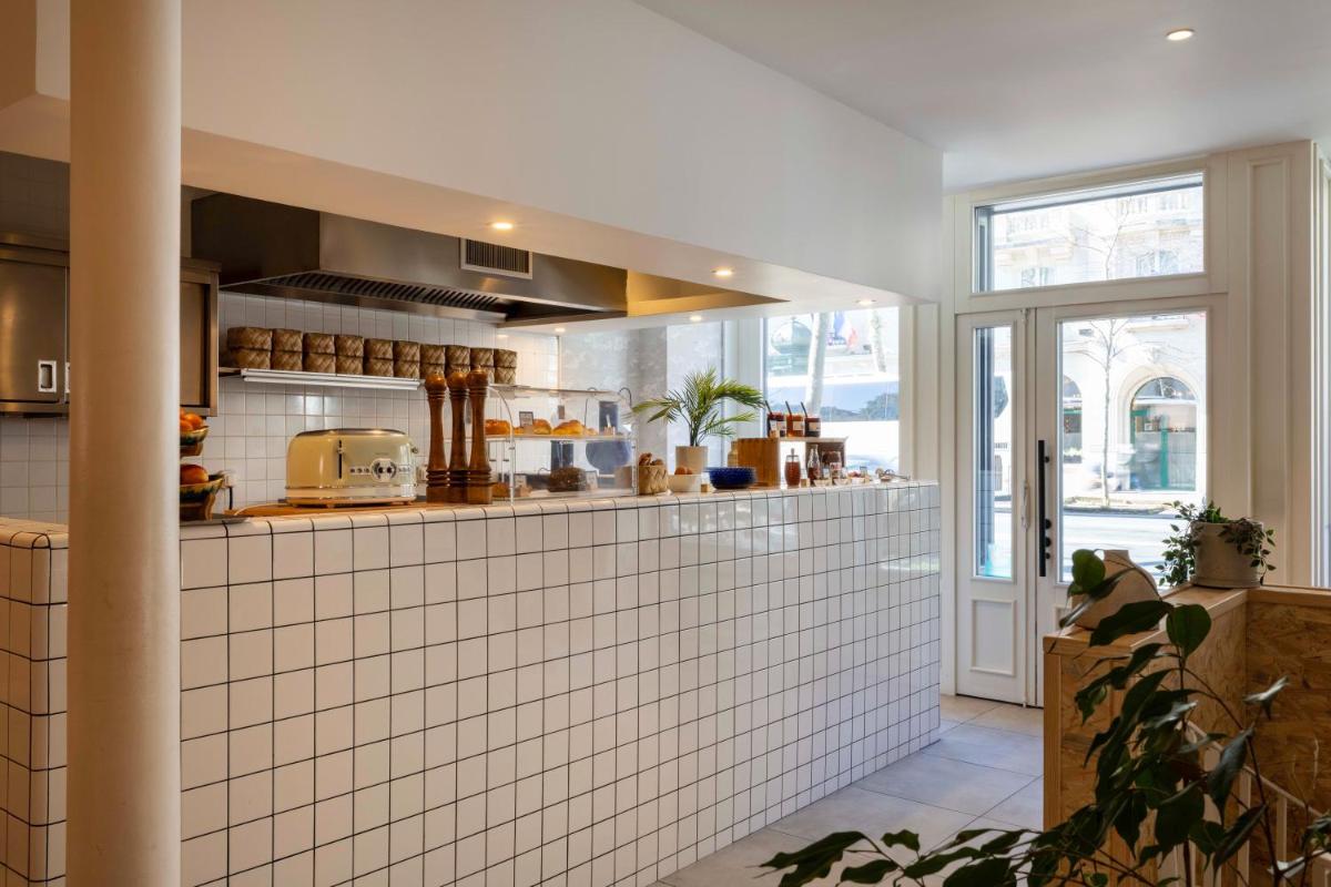 Cuisine ou kitchenette dans l'établissement Hotel Locomo - Gare de Lyon Bastille