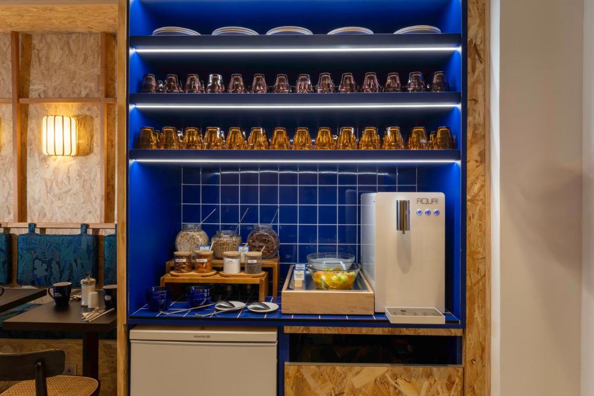 Cuisine ou kitchenette dans l'établissement Hotel Locomo - Gare de Lyon Bastille