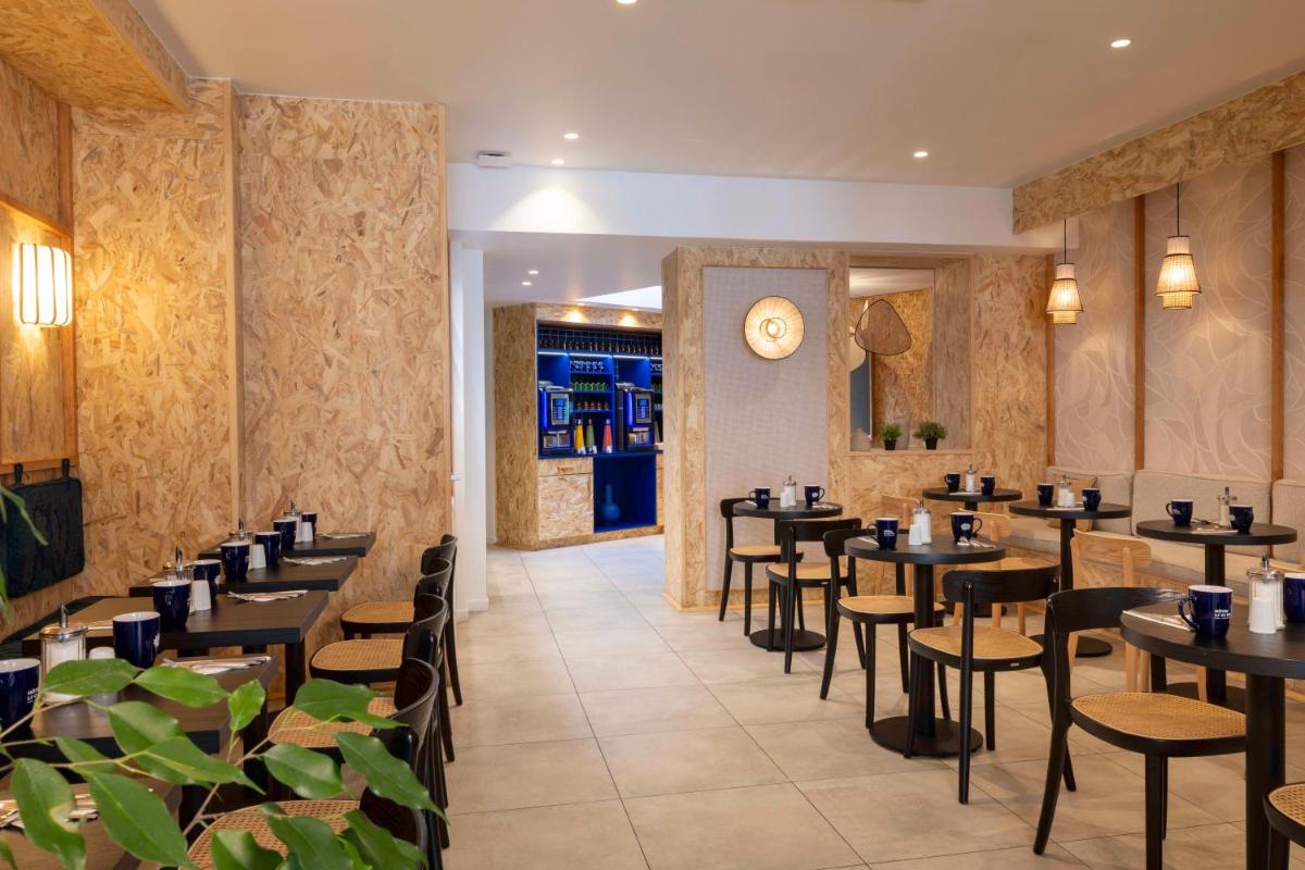 Restaurant ou autre lieu de restauration dans l'établissement Hotel Locomo - Gare de Lyon Bastille