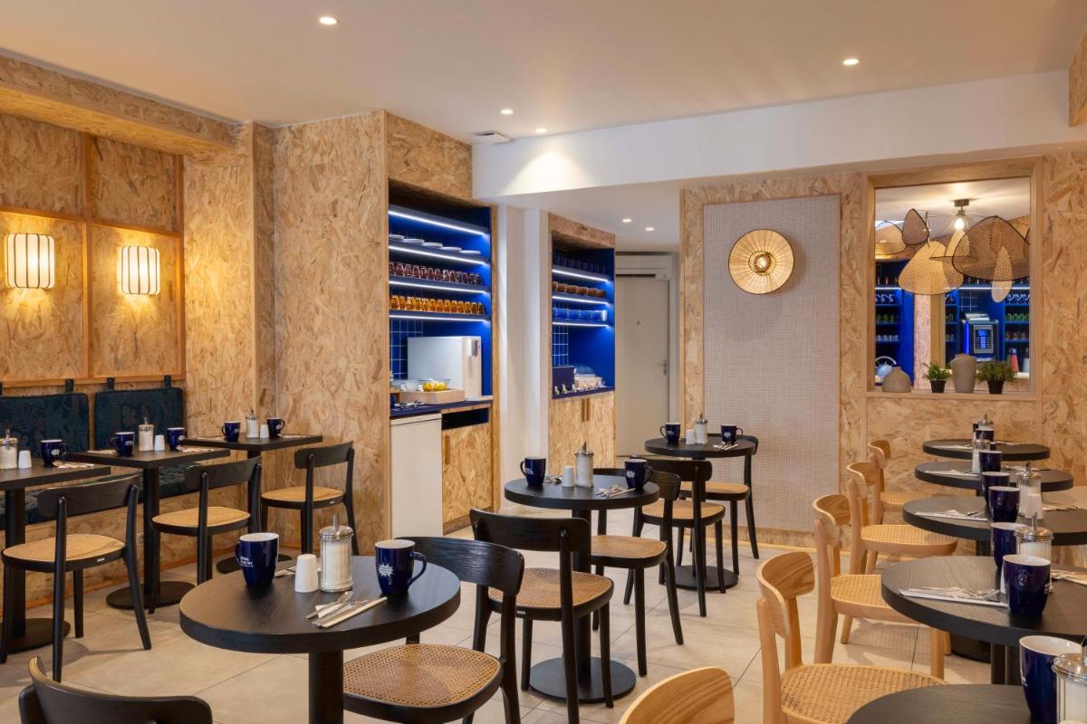 Restaurant ou autre lieu de restauration dans l'établissement Hotel Locomo - Gare de Lyon Bastille