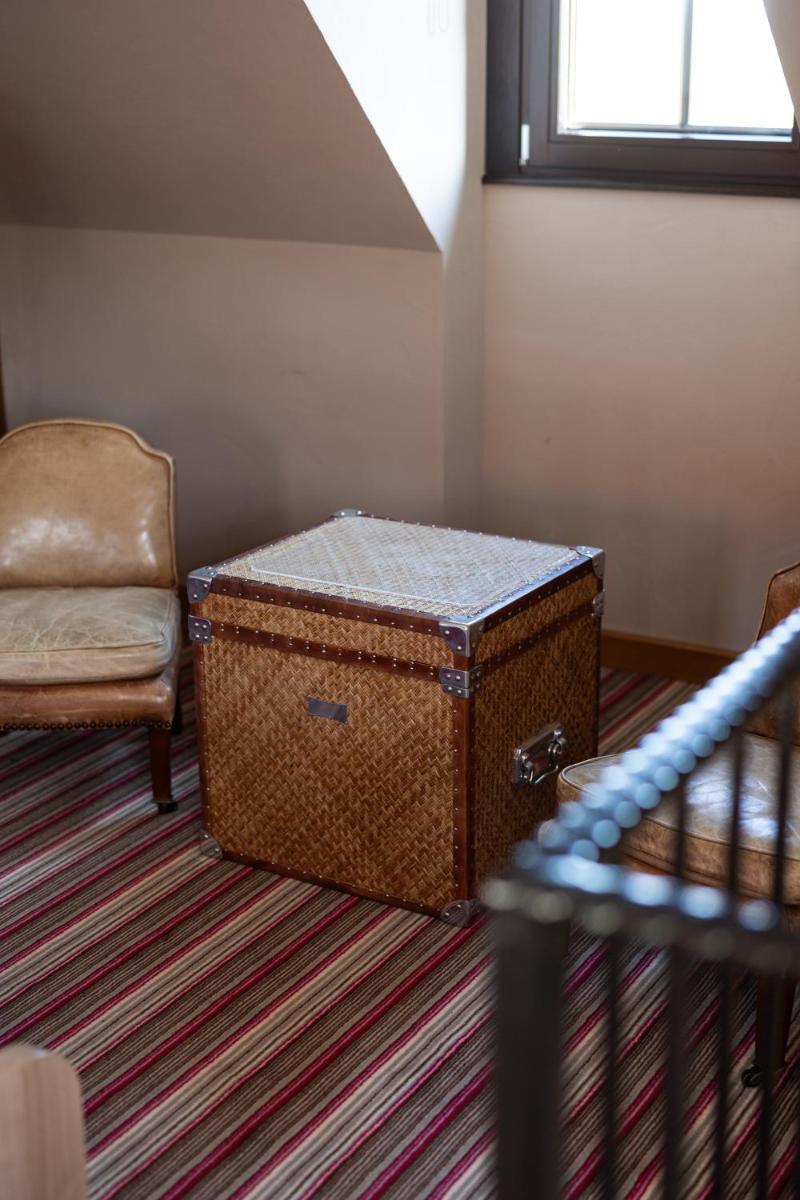 Coin salon dans l'établissement Hôtel Arnold