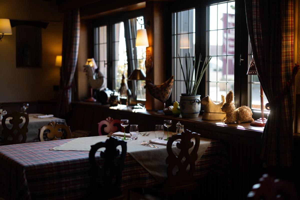 Restaurant ou autre lieu de restauration dans l'établissement Hôtel Arnold
