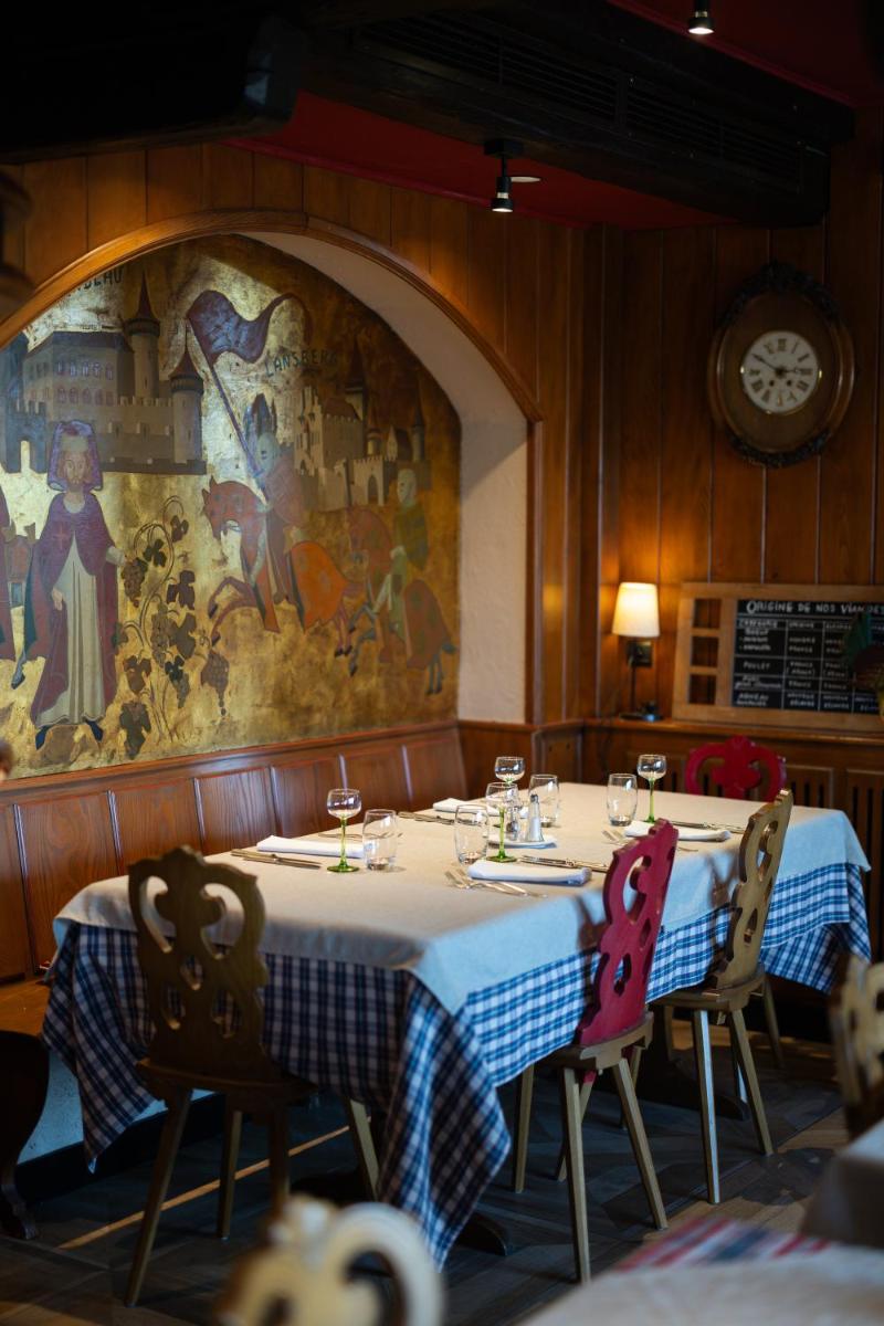 Restaurant ou autre lieu de restauration dans l'établissement Hôtel Arnold