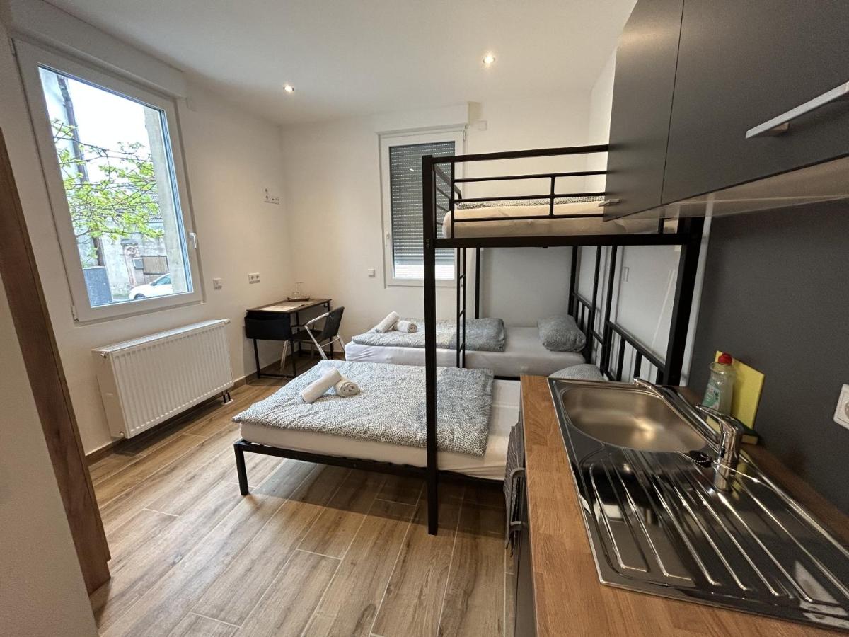 Ein Bett oder Betten in einem Zimmer der Unterkunft Family and Friends Hassloch