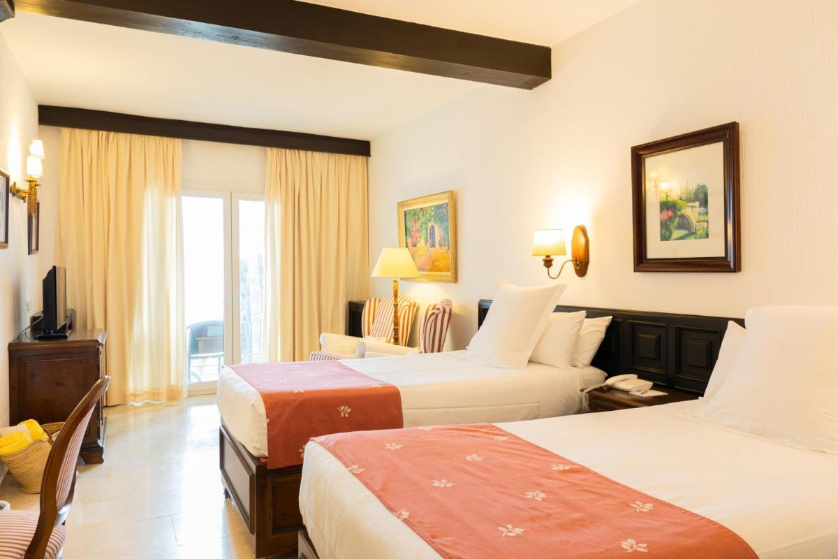 Cama o camas de una habitación en Hotel Bon Sol Resort & Spa