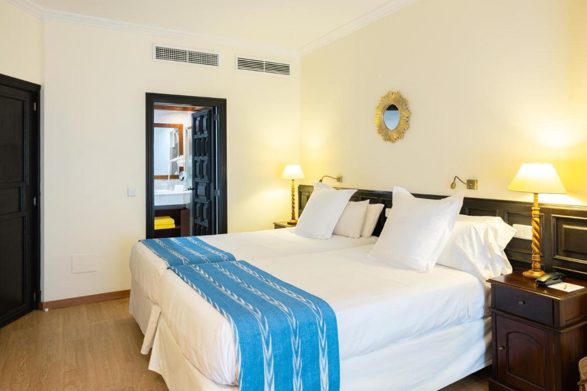 Cama o camas de una habitación en Hotel Bon Sol Resort & Spa