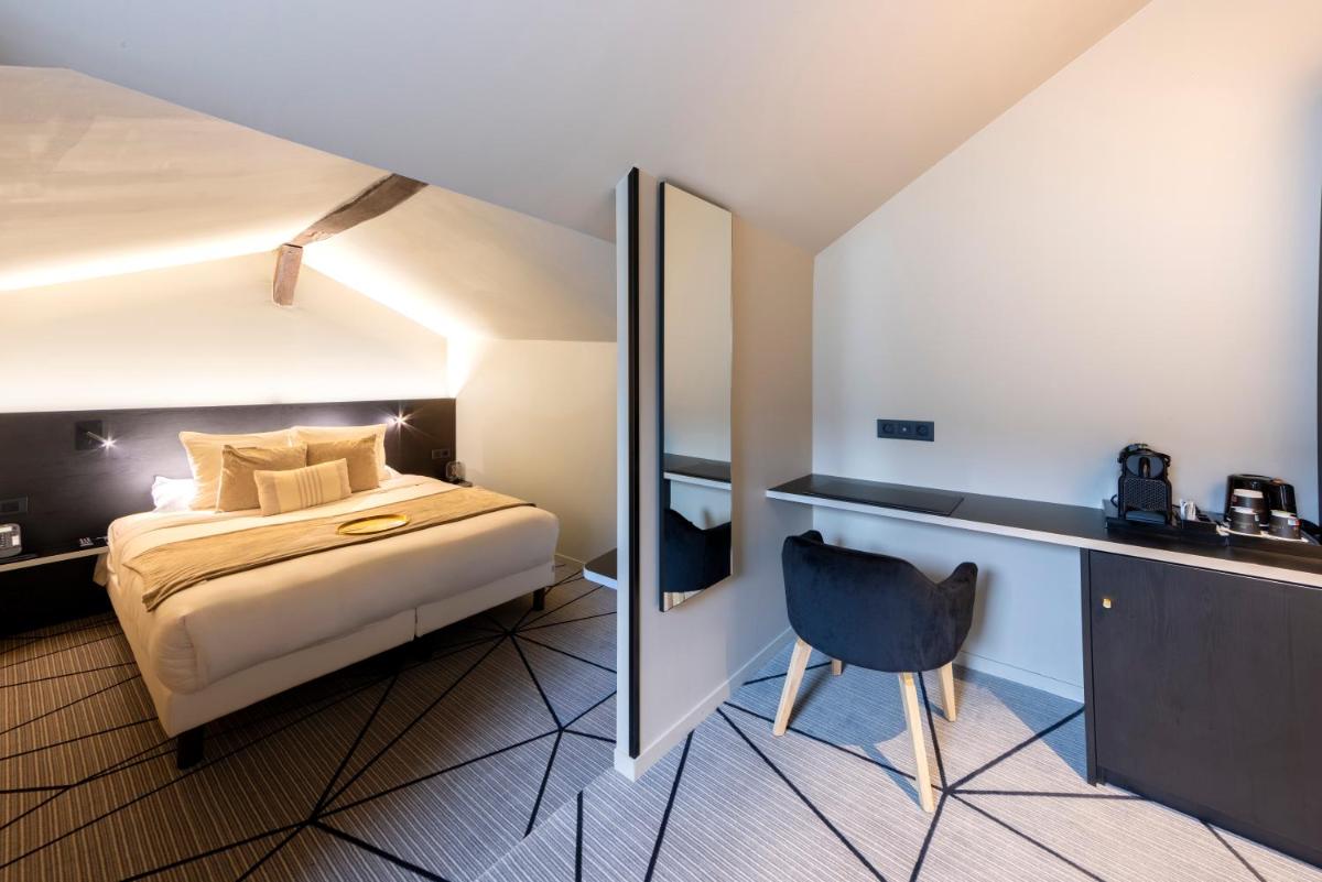 Un ou plusieurs lits dans un hébergement de l'établissement Hotel Leprince, Best Western Premier Collection