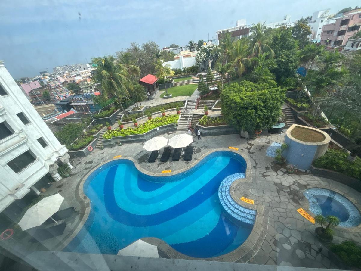 an aerial view of a swimming pool at a resort at Le Royal Meridien Chennai in Chennai
