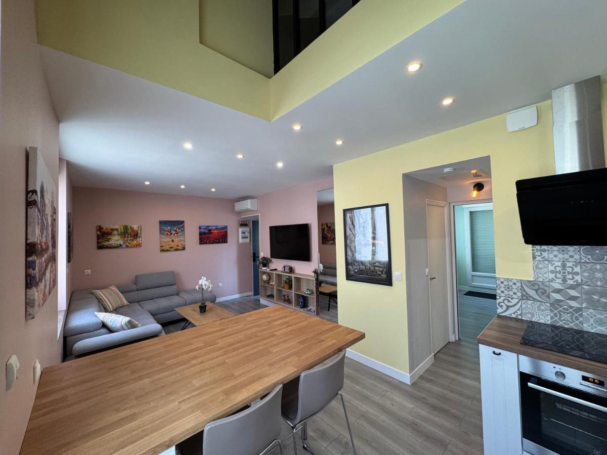 70m2 climatisé - Parking privé - Terrasse - 2 chambres - Lycée Roosevelt - Reims Arena - Hizvo