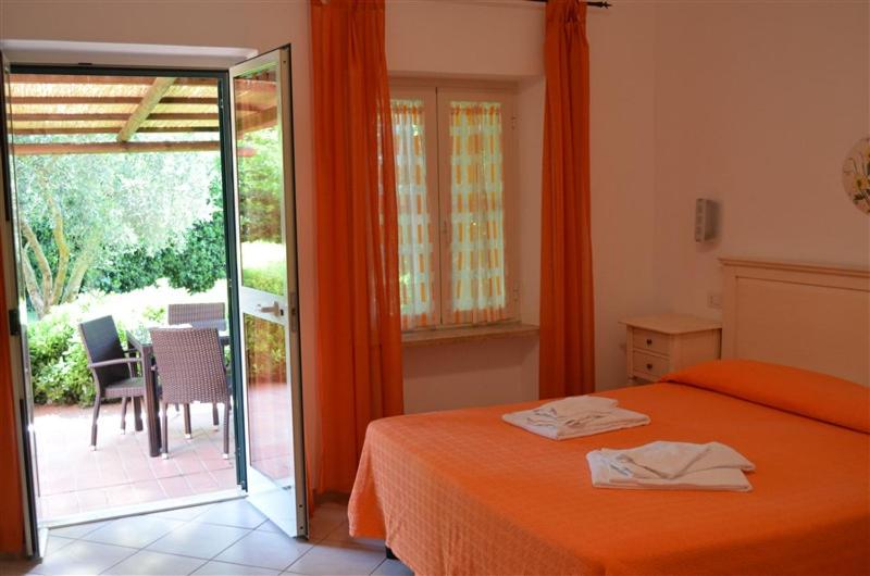 Agrialbergo Capalbio - Hotel Il Cipresso - Housity