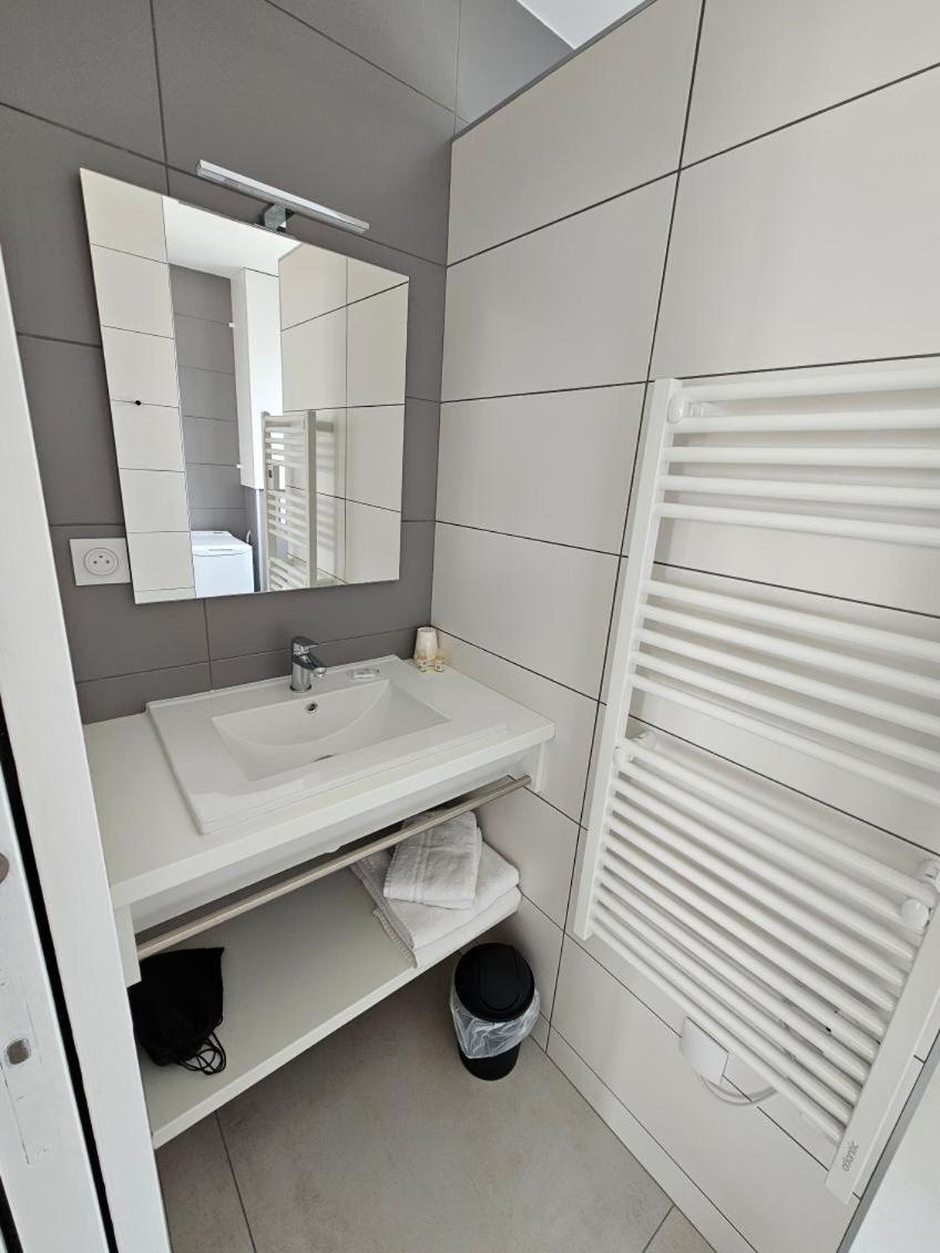 Salle de bains dans l'établissement Hotel Les Dunes