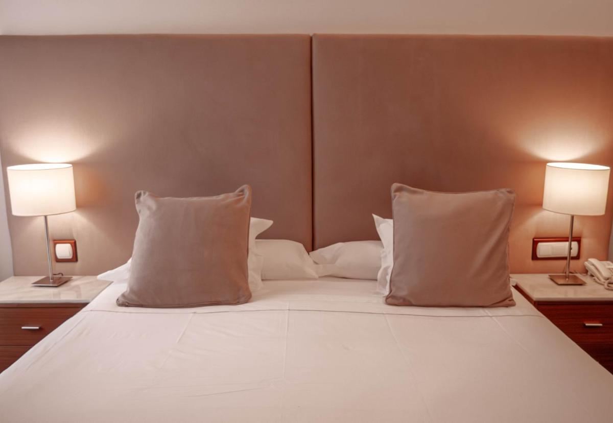 Cama o camas de una habitación en Gran Hotel Soller