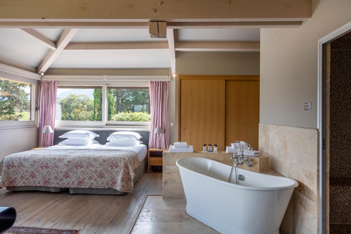 Un ou plusieurs lits dans un hébergement de l'établissement La Signoria & Spa