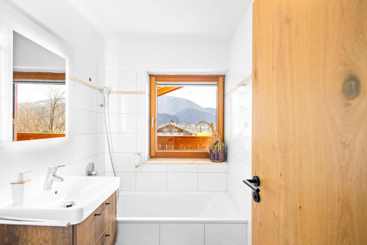 Ein Badezimmer in der Unterkunft Soho Mountain Chalet - Pool und Sauna