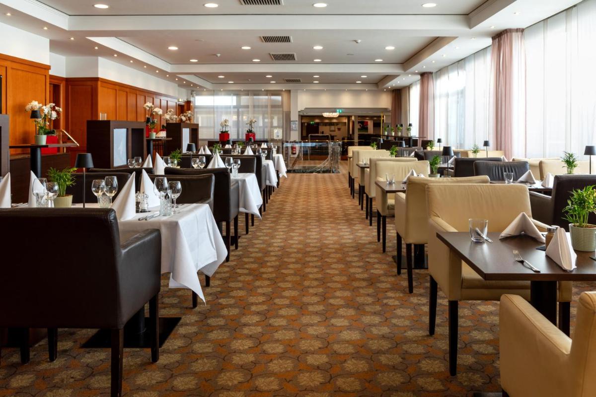 H4 Hotel Frankfurt Messe - Housity