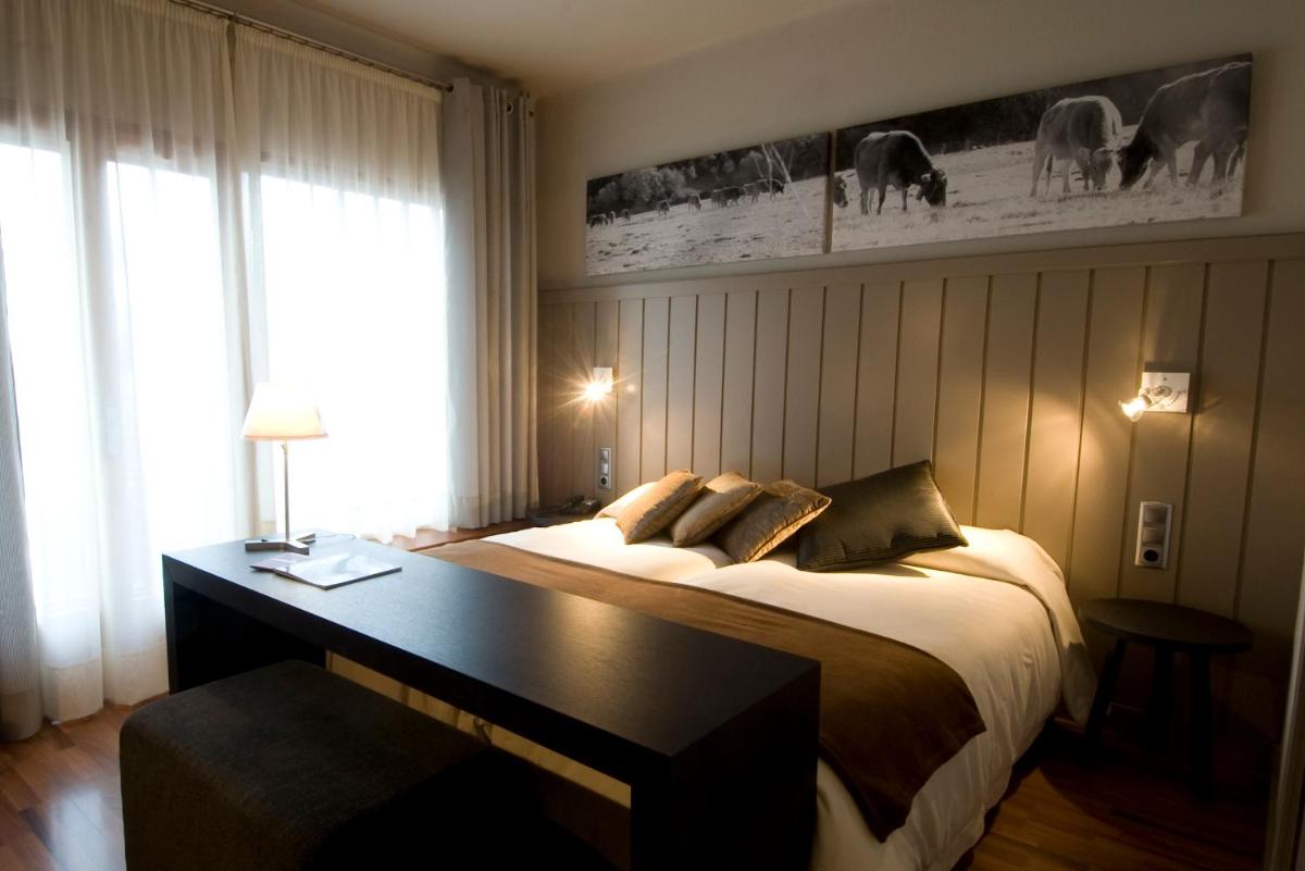 Cama o camas de una habitación en Hotel Restaurant Pessets & SPA