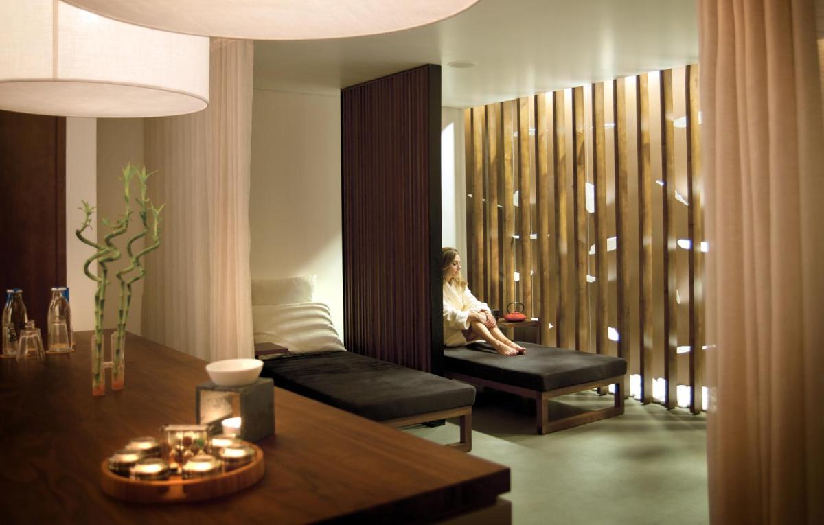 Uma área de estar em Inspira Liberdade Boutique Hotel