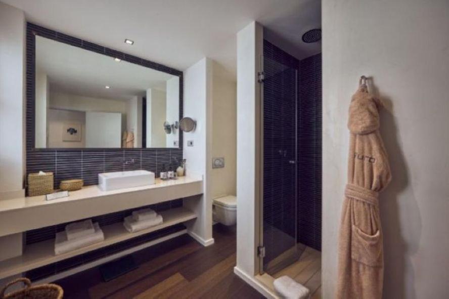 Un baño de Puro Hotel Oasis Urbano