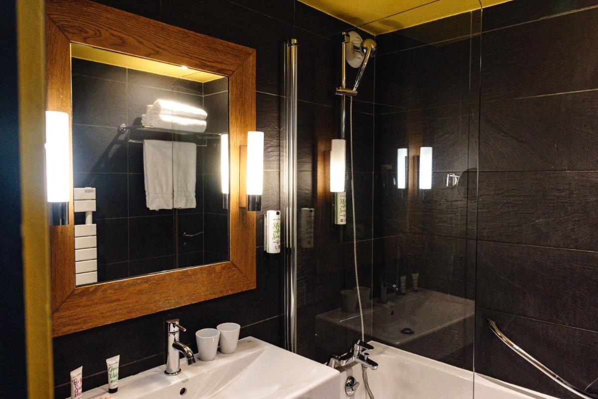 Salle de bains dans l'établissement Hôtel Les Aiglons Chamonix