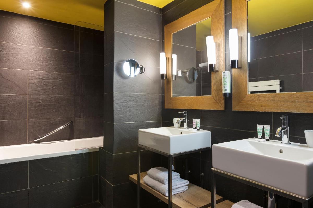 Salle de bains dans l'établissement Hôtel Les Aiglons Chamonix