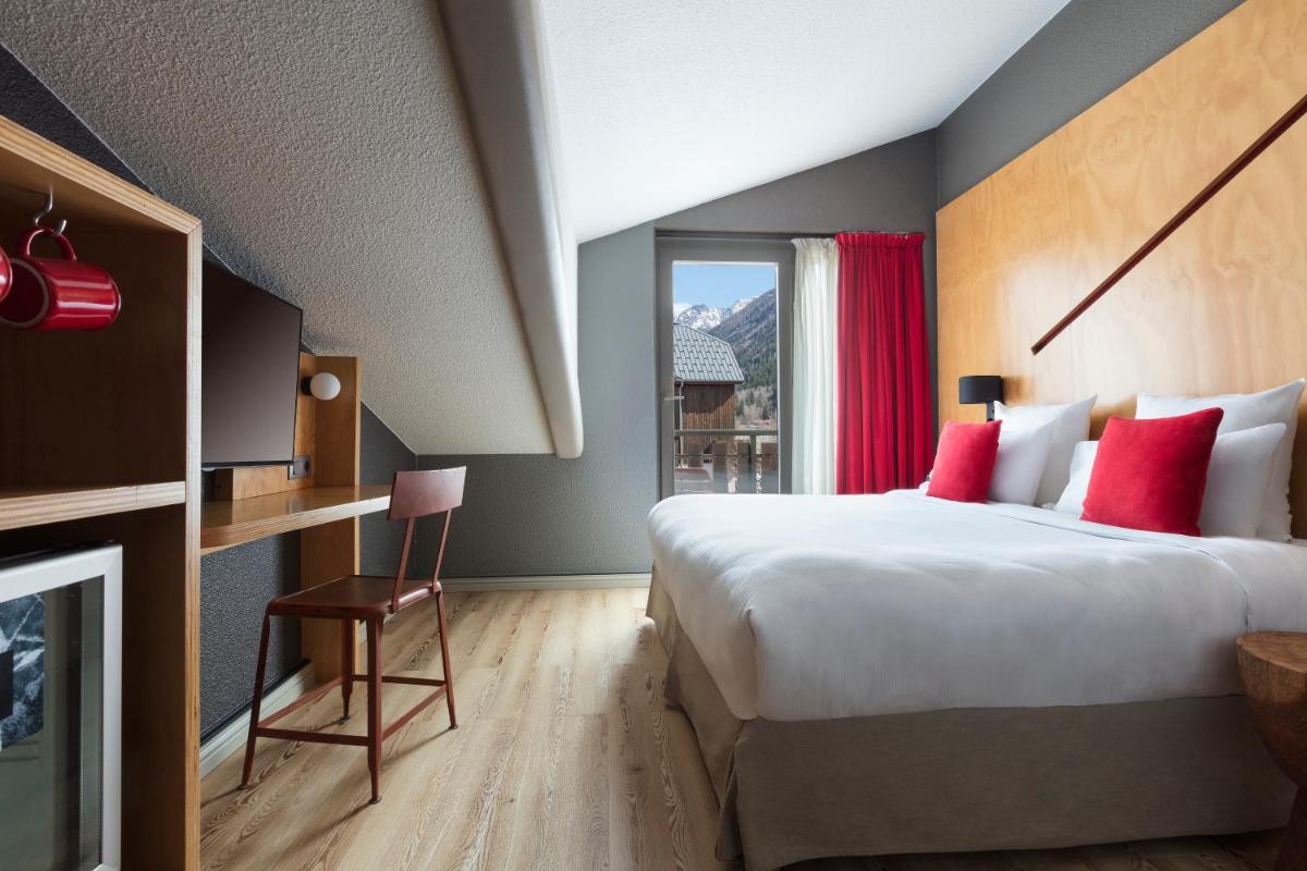 Un ou plusieurs lits dans un hébergement de l'établissement Hôtel Les Aiglons Chamonix