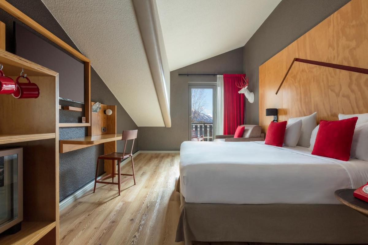 Un ou plusieurs lits dans un hébergement de l'établissement Hôtel Les Aiglons Chamonix