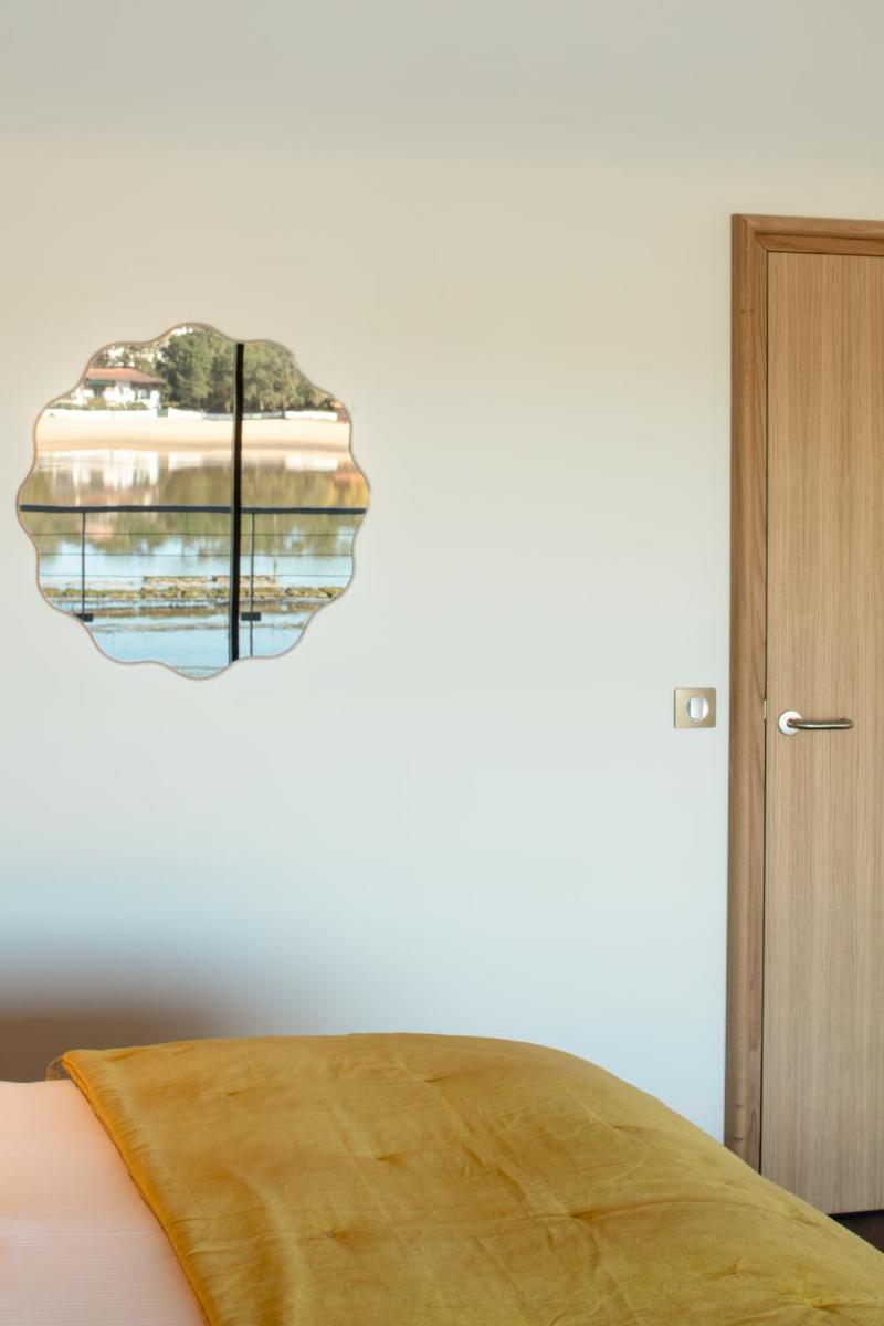 Un ou plusieurs lits dans un hébergement de l'établissement Hôtel & Spa Villa Seren