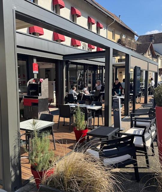 Restaurant ou autre lieu de restauration dans l'établissement La Table de Gustave