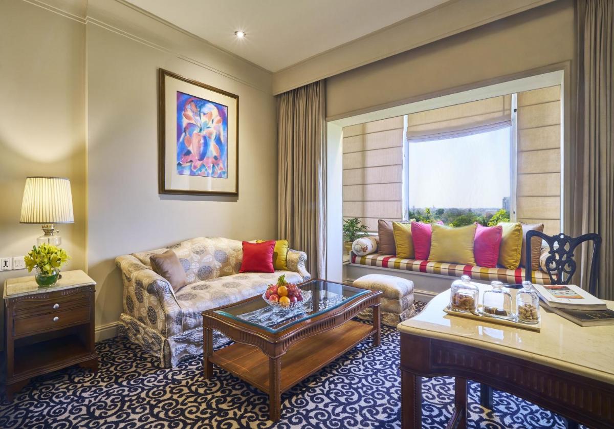 a living room with a couch and a table at Taj Bengal in Kolkata