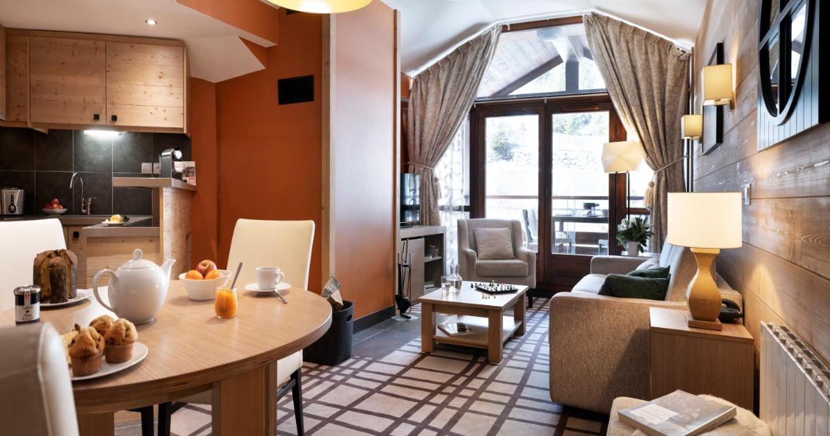 Coin salon dans l'établissement Résidence Pierre & Vacances Premium Les Terrasses d'Hélios
